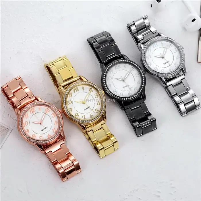 Montre élégante à quartz avec bracelet en maille et strass pour femme