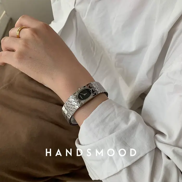 Montre en argent avec bracelet en acier inoxydable pour femme