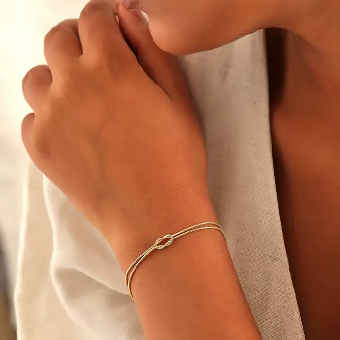 Bracelets de couple avec nœud d'amour