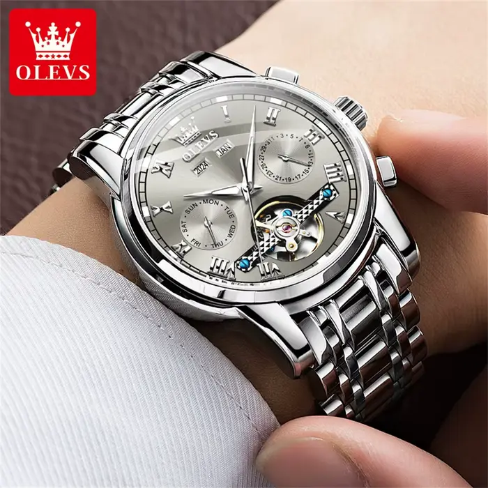 OLEVS 6607 montres entièrement automatiques en acier inoxydable squelette volant double calendrier haut de gamme marque montre-bracelet mécanique pour hommes