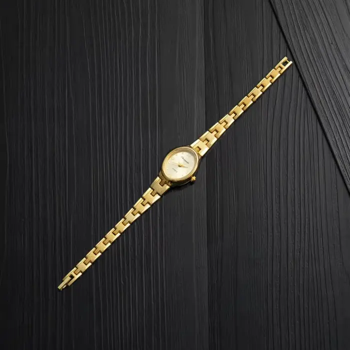 Montre en or JBAILI pour femme élégante avec cadran ovale mouvement quartz occasion spéciale cadeau