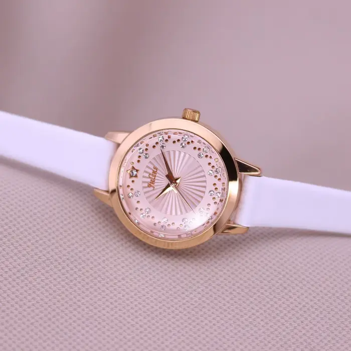 Montre à quartz en cuir avec petits biscuits pour femme