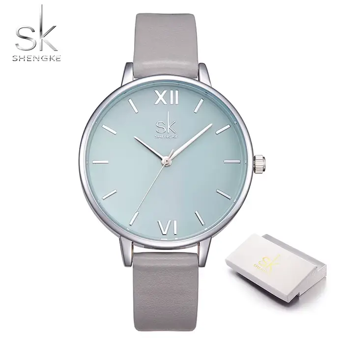 Montres à quartz dorées pour femmes