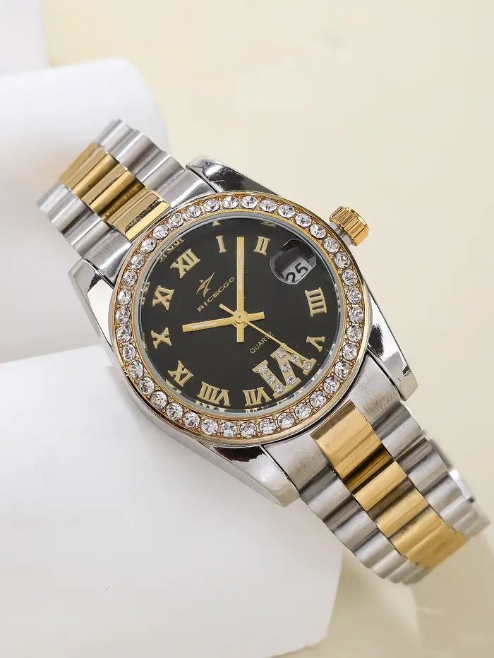 Montre à quartz de luxe pour femme bracelet en acier inoxydable bicolore lunette sertie de strass cadran à chiffres romains avec affichage de la date pour femmes occasions spéciales