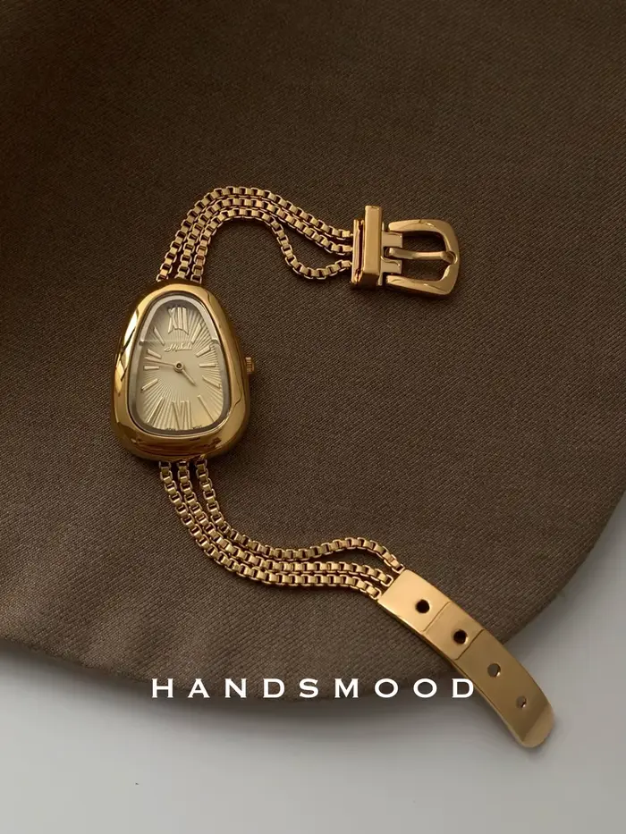 Montre rétro haut de gamme en or pour femme style vintage cadeau acier inoxydable quartz occassions spéciales femmes