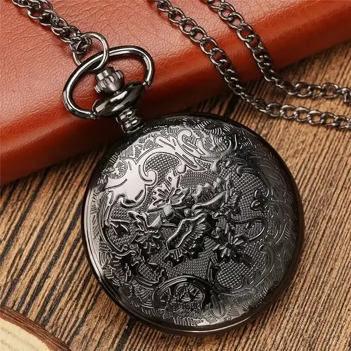 Montre de poche en bronze gravée chiffres romains