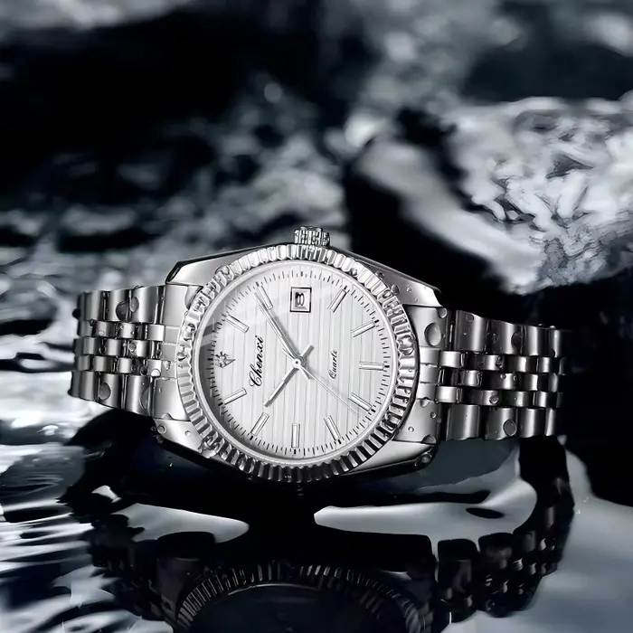 Montre en acier inoxydable avec calendrier complet et résistance à l'eau pour homme style décontracté occasions quotidiennes et spéciales
