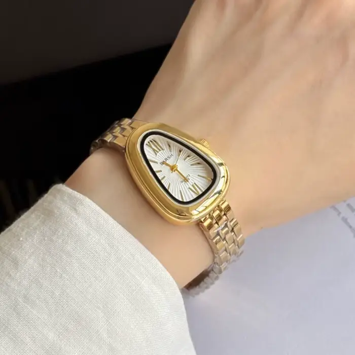 Marque serpent tête cadran femmes montre de luxe dames montres à Quartz en forme de gouttelette chiffre romain bracelet