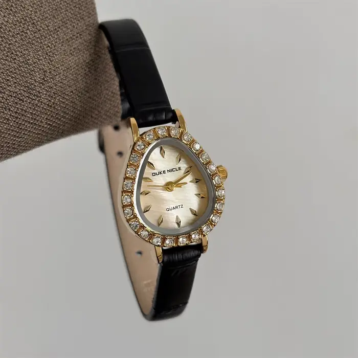 Montre à Quartz de luxe pour femmes, ovale doré, cadran délicat, noir, Vintage, cuir, élégante, mode