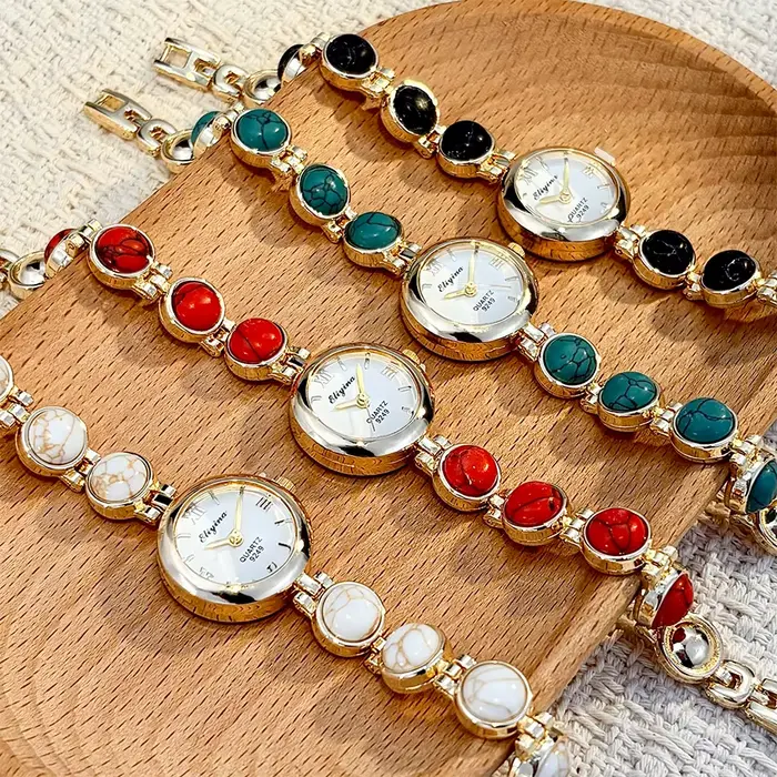 Montre-bracelet vintage pour femme ornée de pierres - Exquise