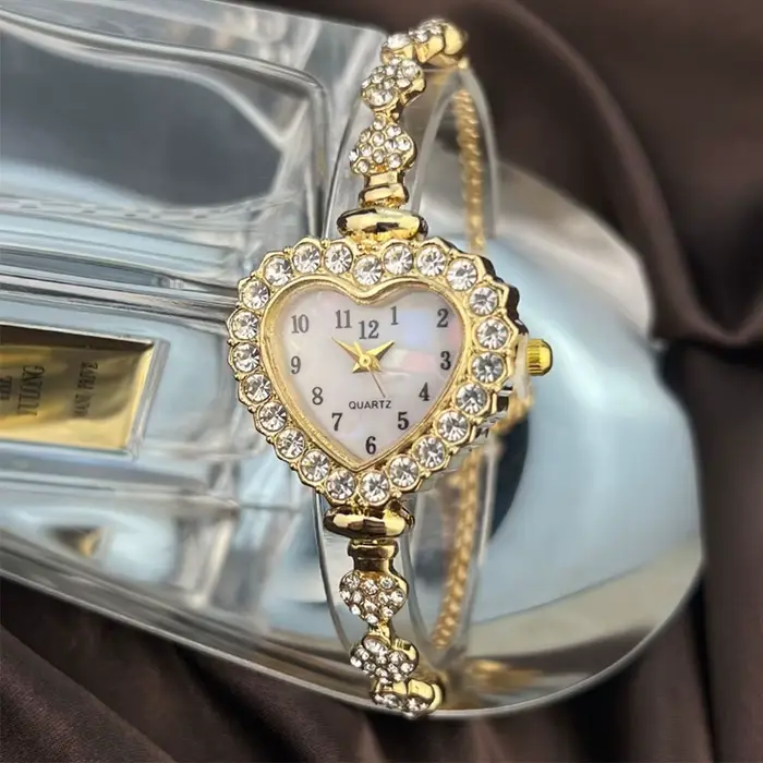 Nouvelles montres à Quartz en acier inoxydable montre en forme de coeur avec Bracelet réglable femmes montre-Bracelet décoration de poignet exquise