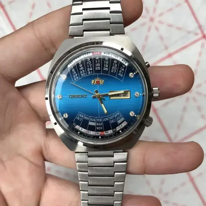 Montre automatique mécanique unisexe Orient 118A avec grand cadran rotatif