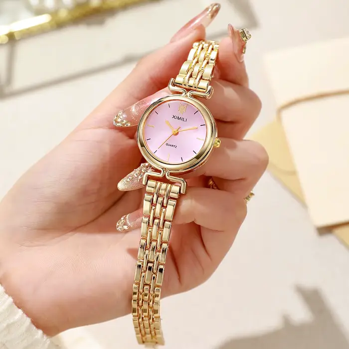 Montre élégante pour femme avec bracelet en acier inoxydable, quartz, design simple et résistant aux chocs pour toutes les occasions