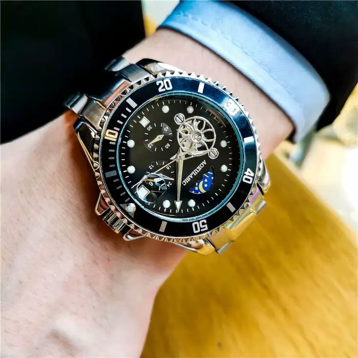 Tourbillon Phase de lune squelette montres mécaniques lunette rotative cadran lumineux luxe automatique montre pour hommes bracelet en acier inoxydable