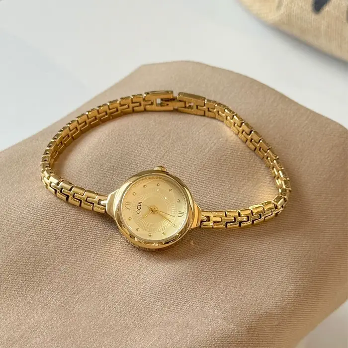 GEDI mode rétro luxe dames montre avec petit cadran rond Bracelet femmes montres et horloges à assortir des tenues 2025 nouveauté