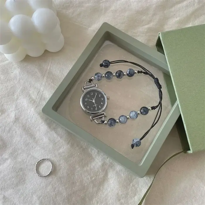 Montre-bracelet perlée élégante avec pendentif pour femmes, bracelet réglable, mouvement à quartz, style simple pour occasions spéciales