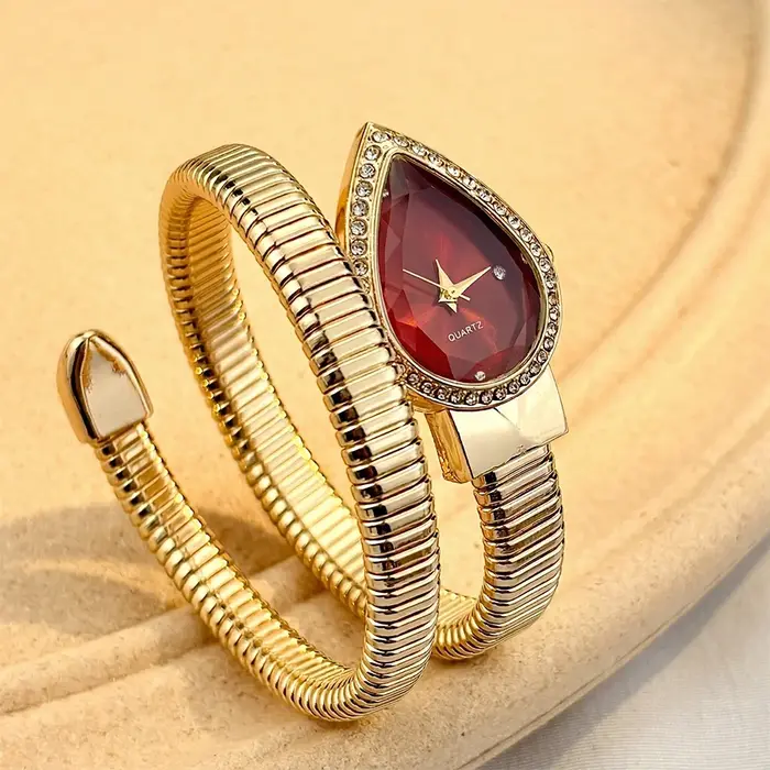 Montre élégante pour femmes avec cadran en forme de goutte d'eau et bracelet en forme de serpent