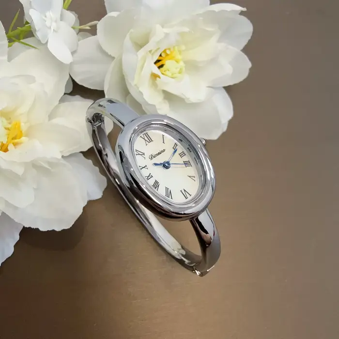 Femmes montre à Quartz de luxe chiffres romains Reloj Vintage Simple horloge ovale dames en cuir noir Orologio or argent montre-bracelet