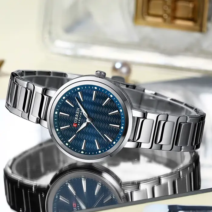 CURREN marque Simple mode dames montre avec cadran ondulé d'eau