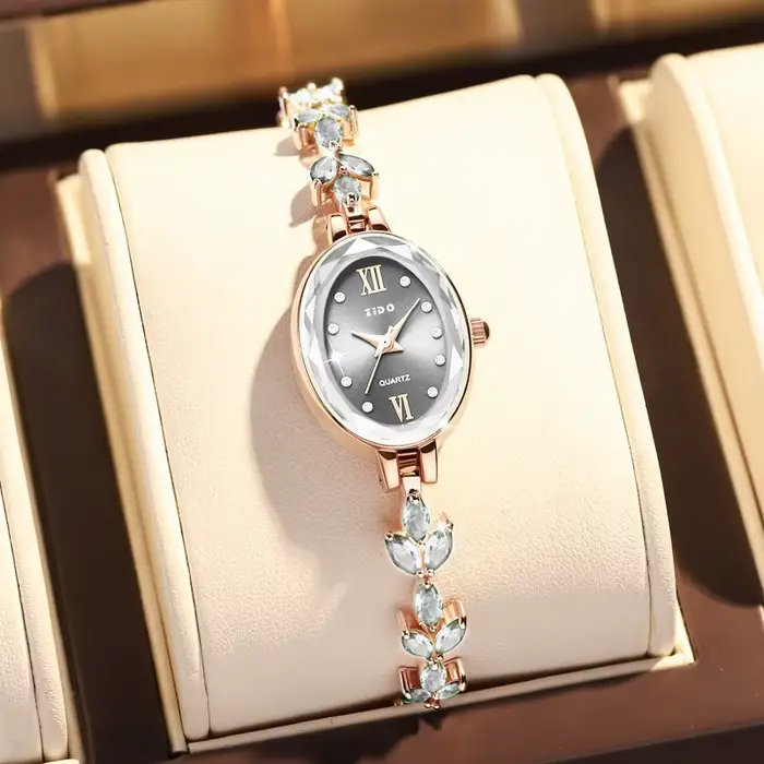 UTHAI femmes montres lumière luxe diamant incrusté pour trèfle montre étanche ovale dames mode Quartz Bracelet