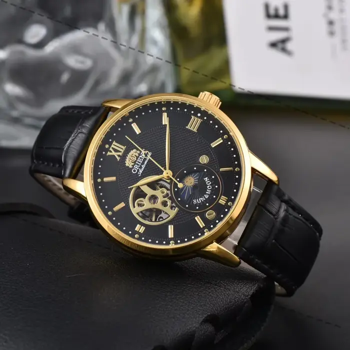 Montre sport mécanique Orient avec soleil, lune et étoiles pour homme, résistance à l'eau, cadran en acier inoxydable, bracelet en cuir, affichage de l'heure mondiale, pour homme élégant et aventureux
