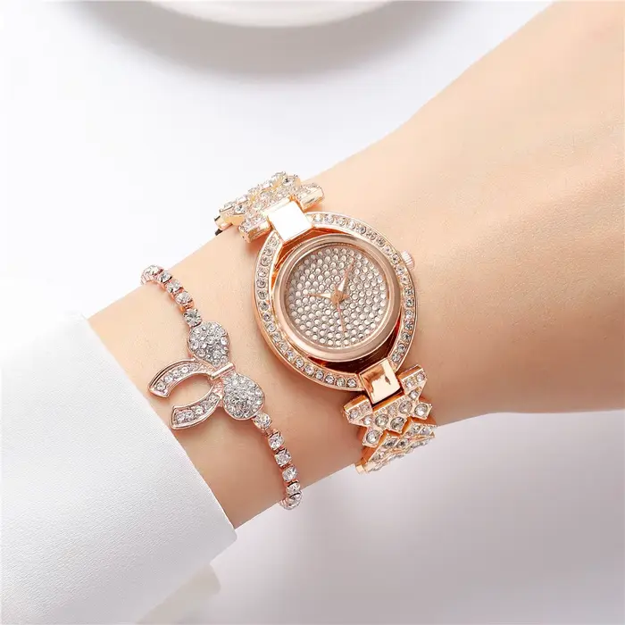 Marques de luxe - Montres à quartz pour femmes - Design créatif avec incrustation de diamants - Montre pour dames en alliage d'or et bracelet en acier inoxydable
