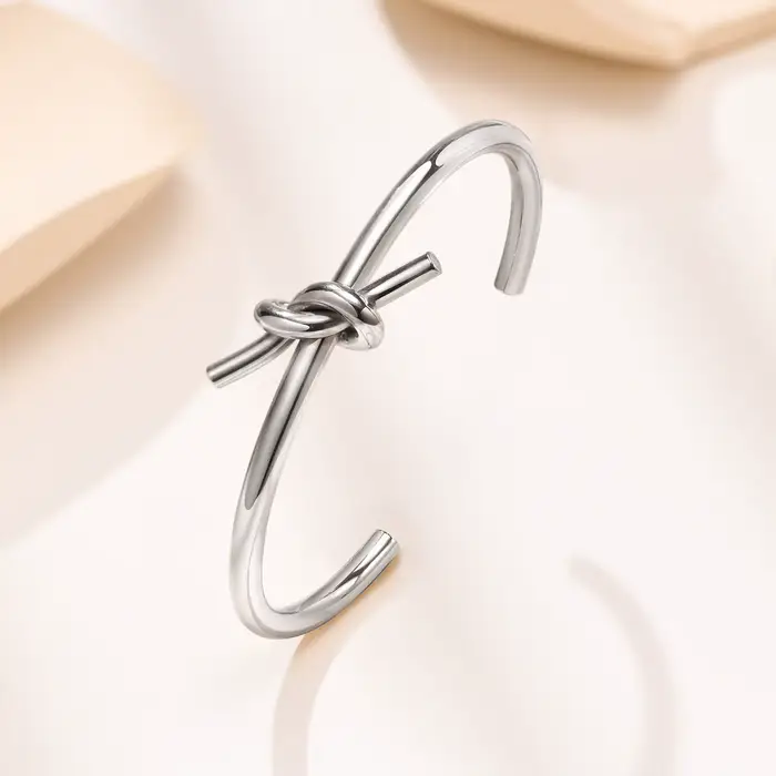 Bracelet en acier inoxydable à noeuds plaqué argent pour femmes occasions spéciales mariage anniversaire style tendance