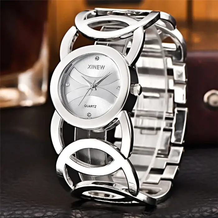 Montre de luxe XINEW en acier inoxydable avec mouvement à quartz pour femmes, élégante et résistante, idéale pour les occasions spéciales et le quotidien