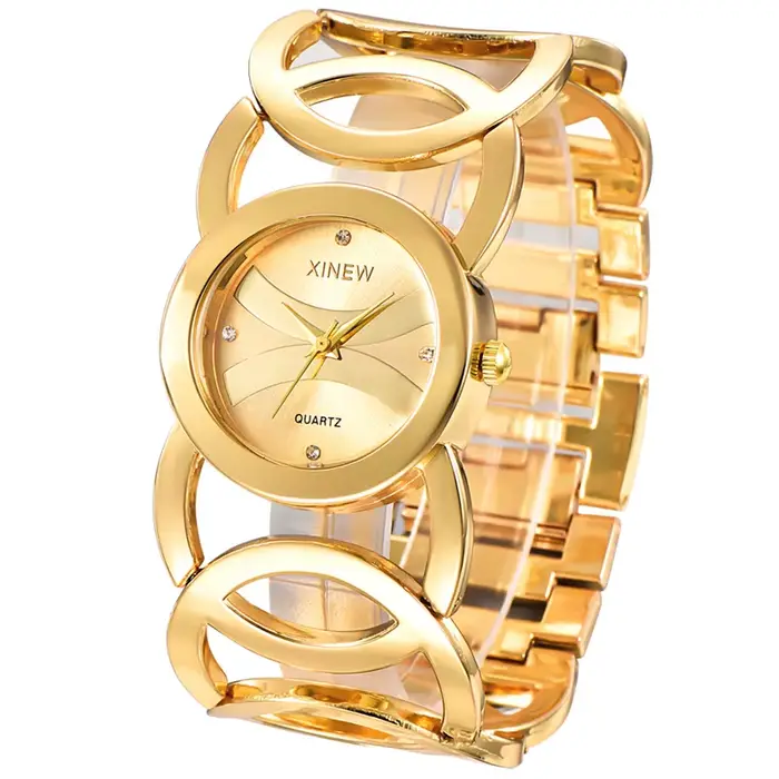 Montre XINEW 6438 pour femme, design décontracté et élégant, idéale pour toutes les occasions, bracelet en alliage doré, mouvement quartz précis
