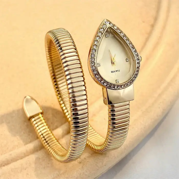 Montre élégante pour femmes avec cadran en forme de goutte d'eau et bracelet en forme de serpent