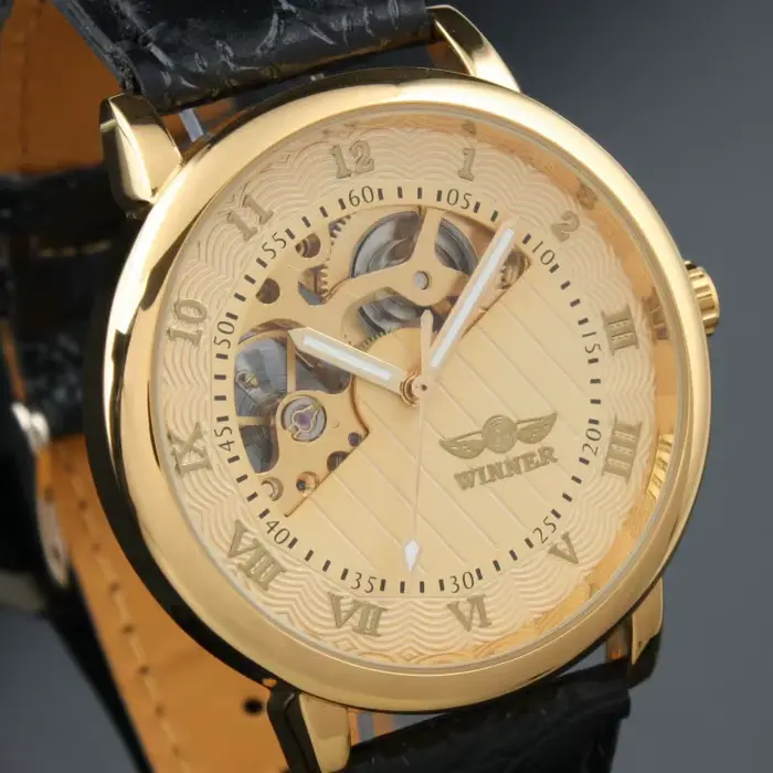 Gagnant célèbre marque mécanique chaude populaire pour hommes homme mode décontracté classique squelette montres cadran en or bracelet en cuir