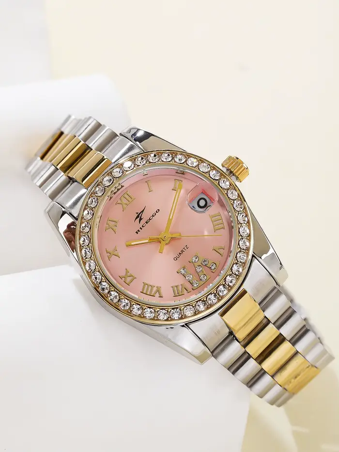 Montre à quartz de luxe pour femme bracelet en acier inoxydable bicolore lunette sertie de strass cadran à chiffres romains avec affichage de la date pour femmes occasions spéciales