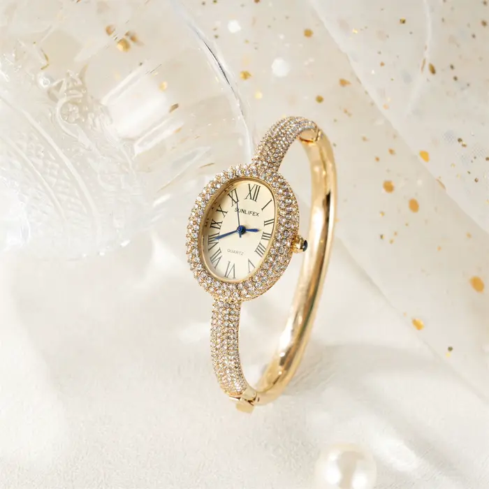 Montre de luxe ovale en cristal pour femmes