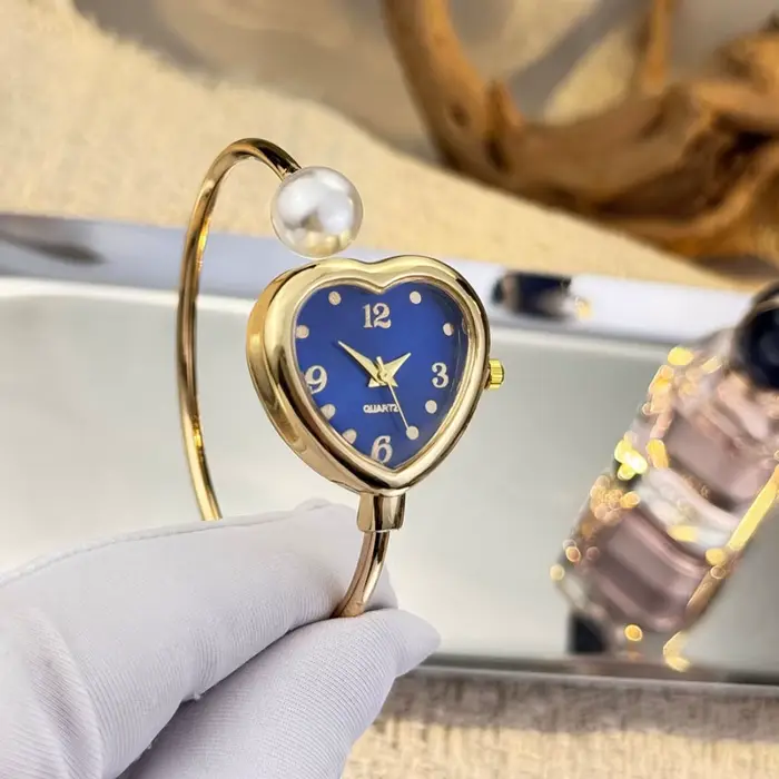 Montre élégante à cadran en forme de cœur avec perles