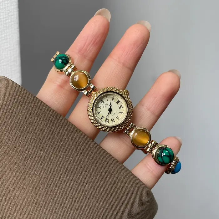 Montre dorée Doudou Design haut de gamme quartz résistante à l'eau pour femmes occasions spéciales élégante à offrir