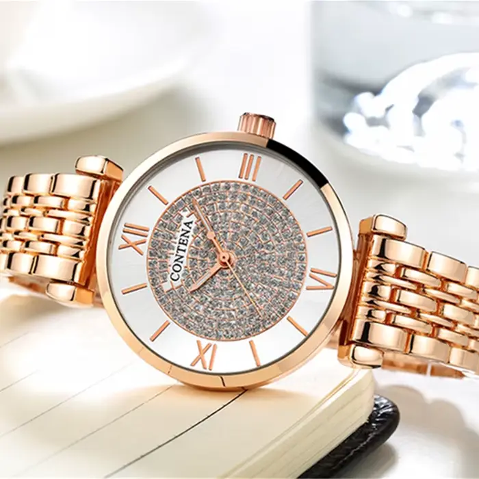 Montre en acier inoxydable avec cadran rond et affichage chiffre romain pour femmes occasions spéciales élégantes