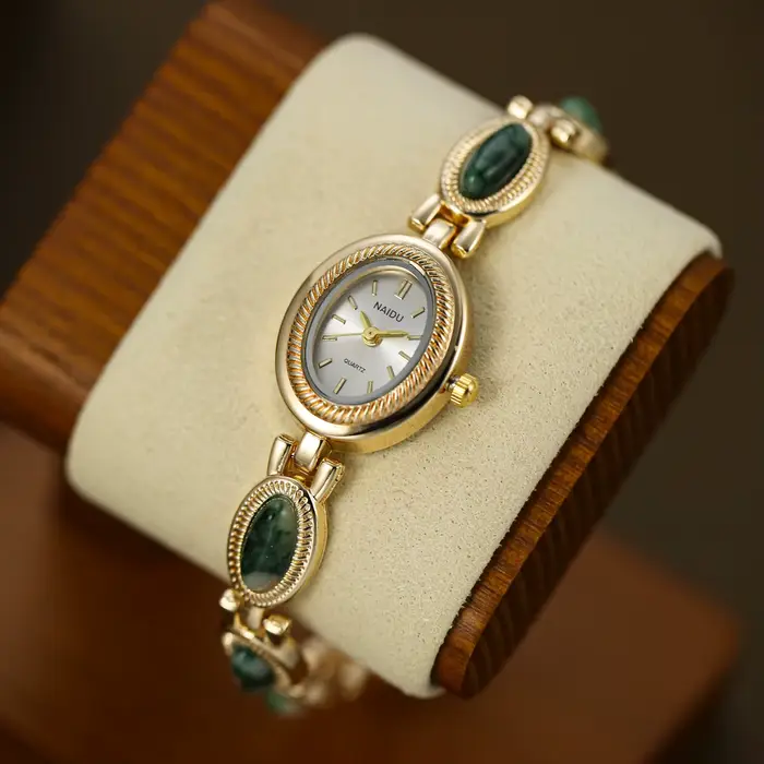 Montre à bracelet incrusté de pierres artificielles pour femmes