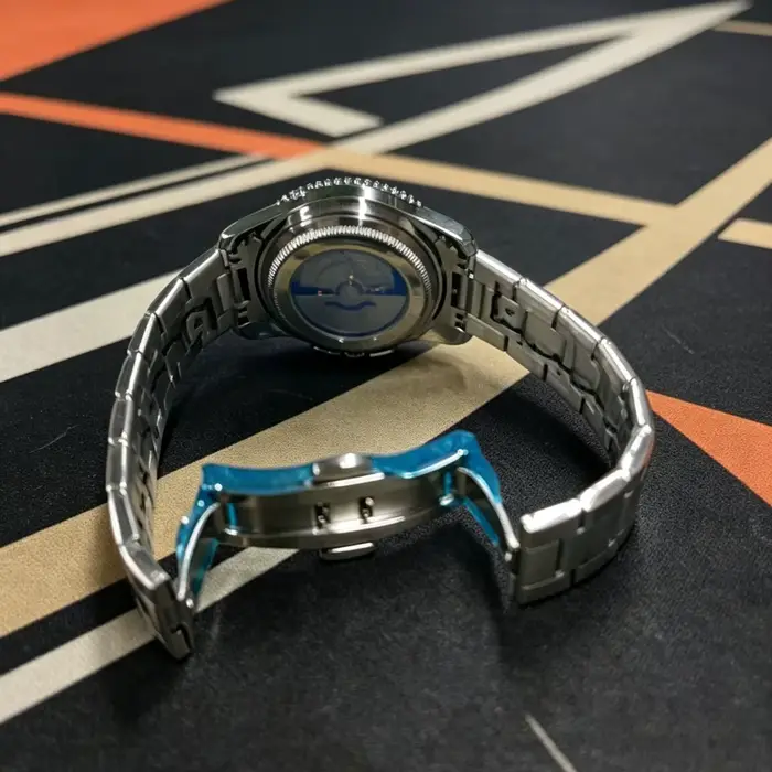 Montre LUOLINGONGJUE en acier inoxydable style business décontracté avec calendrier complet et résistance à l'eau pour homme occasions spéciales