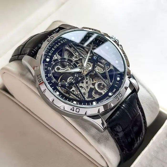 Montre mécanique automatique homme boîtier alliage lumineux bracelet cuir véritable cadran squelette résistance à l'eau occassions spéciales