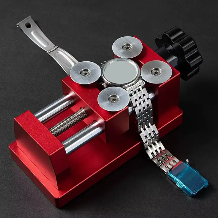 Outil d'entretien et de réparation pour montres : Ouvre-baquet à 4 lames rondes