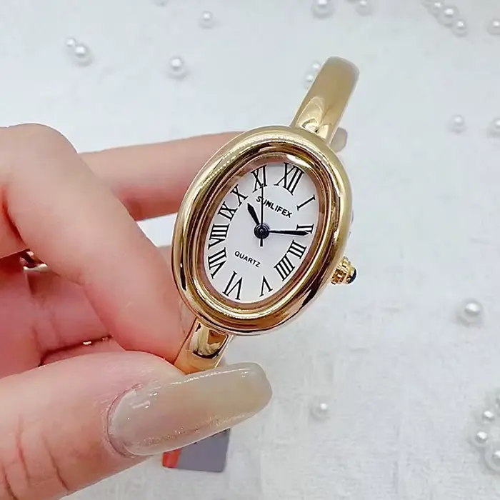 Marque de luxe femmes Rome cadran Montre à Quartz mode or couleurs bracelet montre-bracelet Relogio Feminino livraison