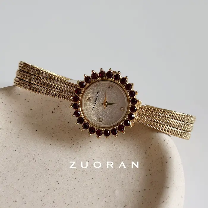 Montre de luxe pour femme élégante et sophistiquée mode décontracté quartz bracelet alliage bronze occassions spéciales