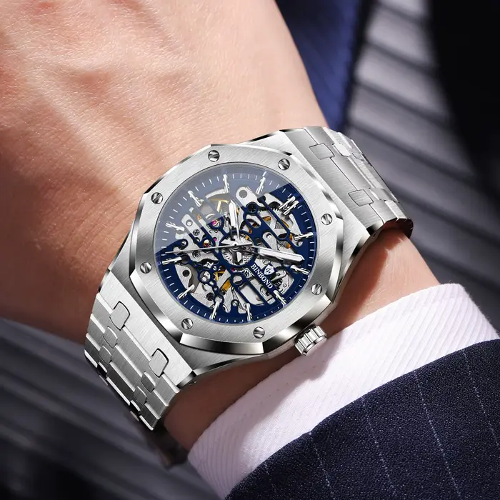 Montre mécanique squelette BINBOND résistante à l'eau pour homme avec mouvement automatique et bracelet en acier inoxydable occasions spéciales et quotidienne