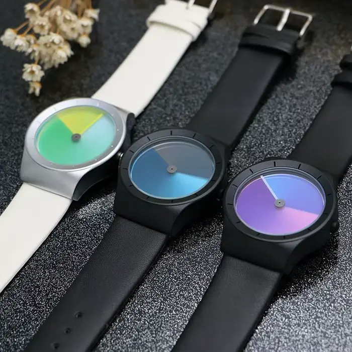 Montre à quartz en cuir véritable pour hommes et femmes