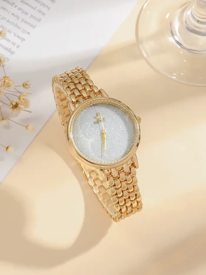 Montre de luxe dorée pour femme, cadran étoilé étincelant avec bracelet en acier inoxydable de quali