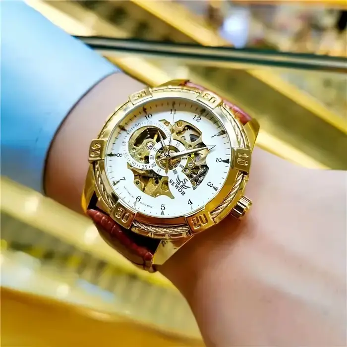 Nouvelle montre mécanique automatique haut de gamme avec design creux double face pour hommes, une m