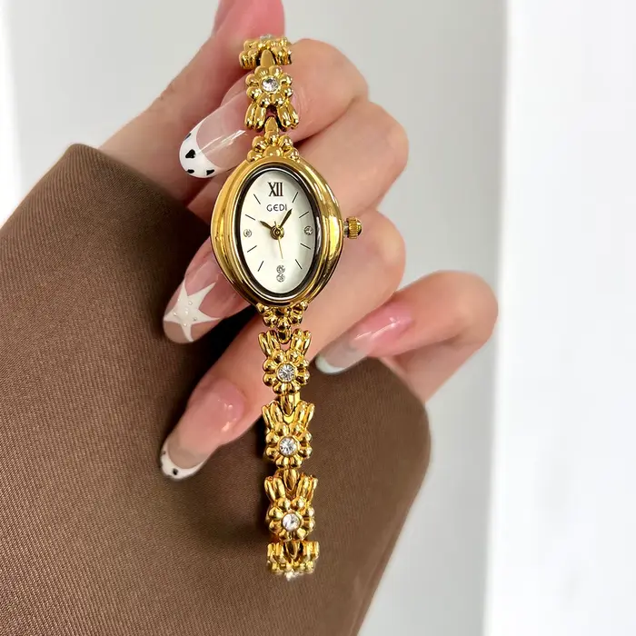 Montre pour femme en alliage avec incrustations de diamants style rétro mode et décontracté pour occasions spéciales