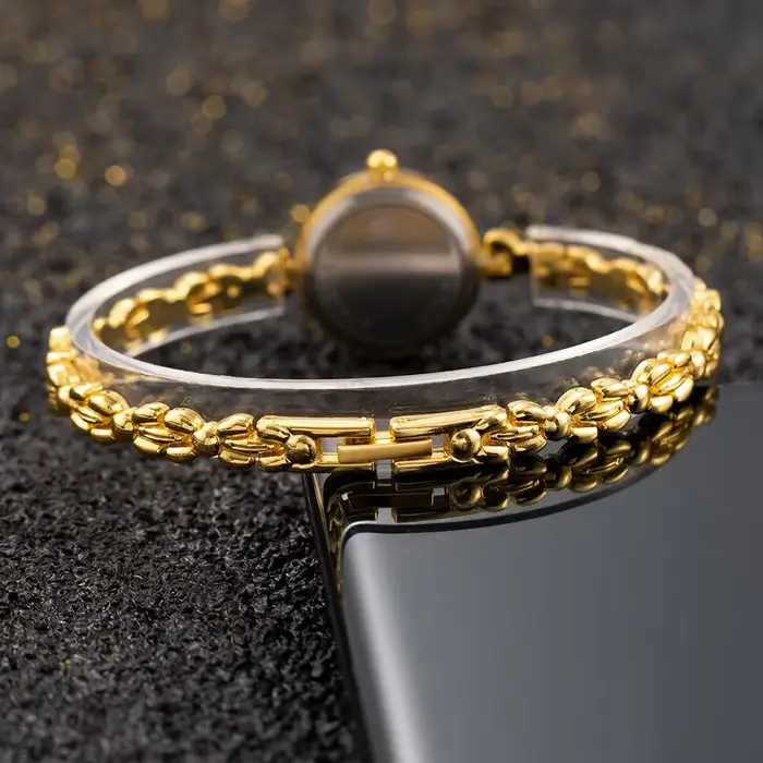 Montre TINUORA Femme Luxe Alliage Doré Élégante Quartz Occasions Spéciales