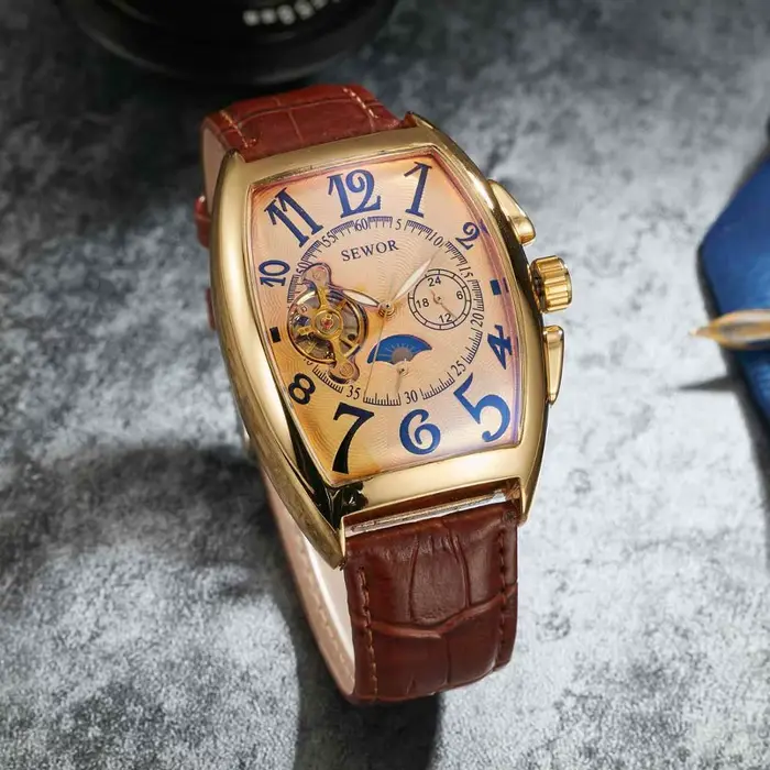 Montre mécanique rétro pour femmes et hommes