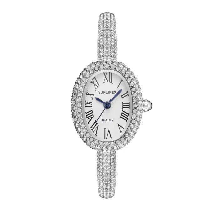 Montre de luxe ovale en cristal pour femmes, cadran à chiffres romains, incrusté de strass, élégante